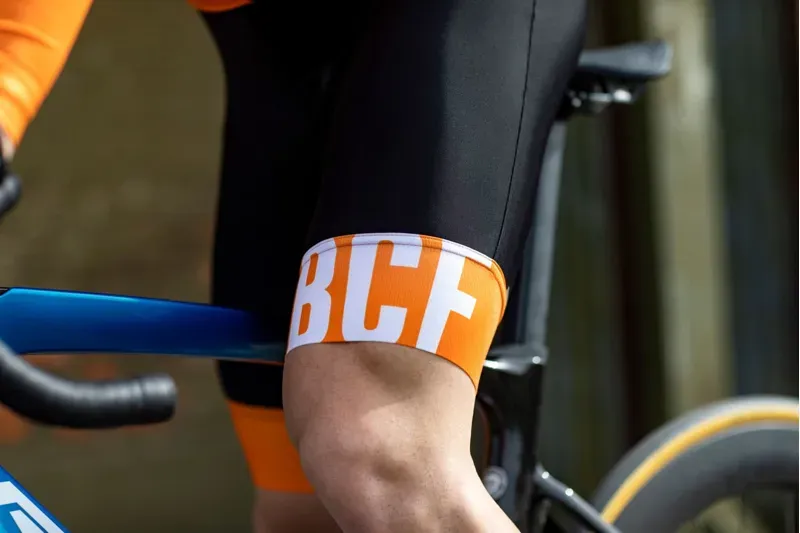 BCF Performance Long Cut Bib Short in Black/Orange-5